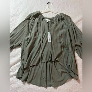 NWT women’s long sleeve blouse.